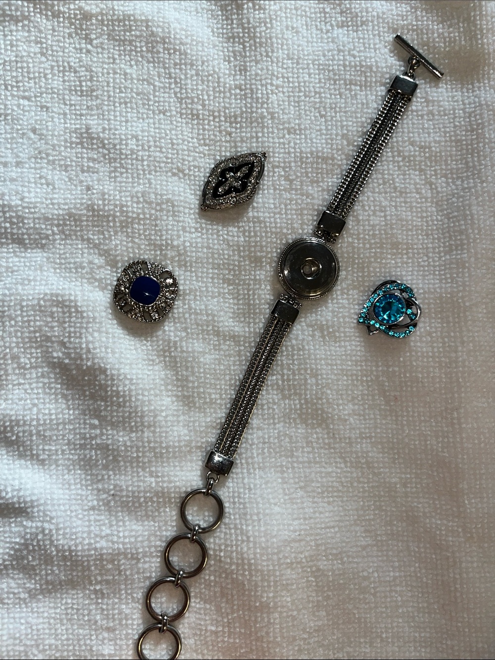 Silver Snap Bracelet with Blue and Teal Decorative Snaps